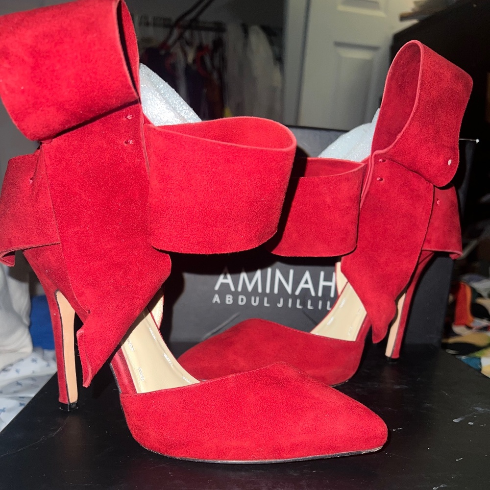 Amina  Abdul Jillil red bow heels